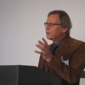 Karl-Heinz Ladeur stands at the lectern and gives a lecture