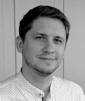 Black and white portrait photo of Lukas Schemper