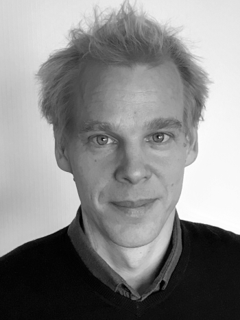 Black and white portrait photo of Matthias Schwartz