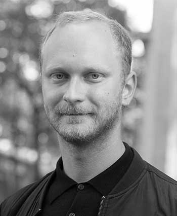 Black and white portrait photo of Sebastian Truskolaski